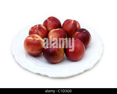 Einige Pfirsiche auf einem Teller Stockfoto