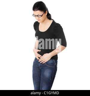Junge Frau mit Magen-Probleme, isoliert auf weiss Stockfoto