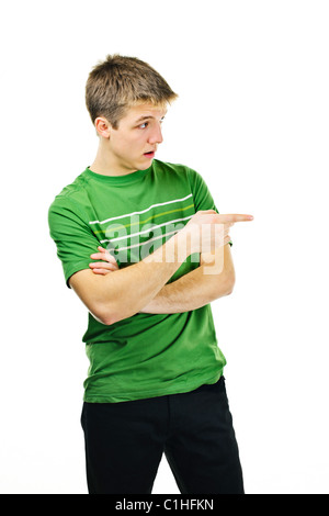 Hübscher junger Mann Wegbeschreibungen Fingerzeig auf die Seite Stockfoto