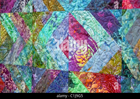 Dieses Foto ist eine abstrakte Quilt in schönen Pastellfarben mit reiche Muster und Texturen, ideal für Hintergründe und andere US Stockfoto