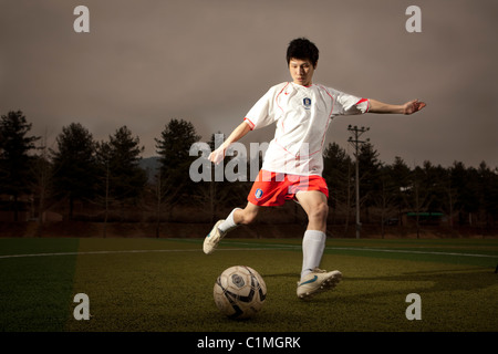 Fußballer mit koreanischen Nationalmannschaft Trikot in Chugju, Chungbuk, Korea Stockfoto