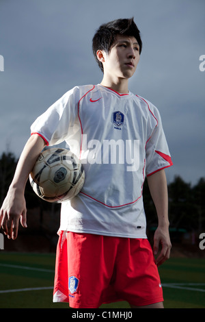 Fußballer mit koreanischen Nationalmannschaft Trikot in Chugju, Chungbuk, Korea Stockfoto