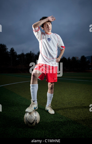 Fußballer mit koreanischen Nationalmannschaft Trikot in Chugju, Chungbuk, Korea. Stockfoto