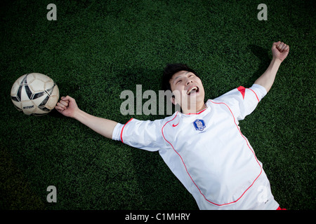 Fußballer mit koreanischen Nationalmannschaft Trikot in Chugju, Chungbuk, Korea Stockfoto