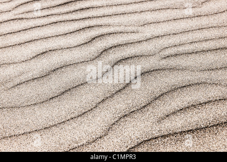 Natürlichen Hintergrund des Sandes in Ripple Wave-Muster Stockfoto