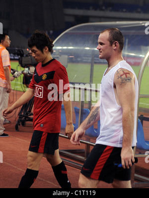 Manchester Uniteds Wayne Rooney Spaziergänge abseits des Platzes in einem Freundschaftsspiel gegen Hangzhou Greentown FC in Huanglong Stockfoto