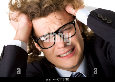 Foto von Trauernden Geschäftsmann in Brillen auf weißem Hintergrund Stockfoto