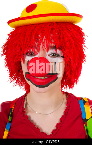 Lustiger Clown mit Blumen und Sonnenschirm im studio Stockfoto