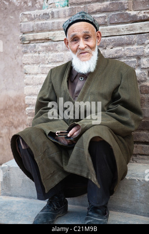 Xinjiang: älterer Mann Uighur Stockfoto