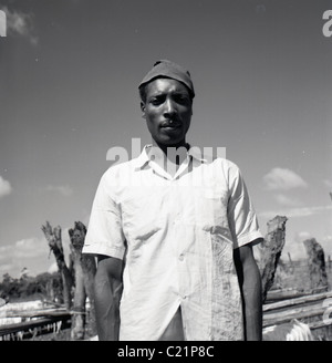 Tunesien, 1950er Jahre. Ein Porträt von einem tunesischen Baumwolle oder Textil Arbeiter, Tunesien, Nordafrika. Eine Fotografie von J Allan Cash. Stockfoto