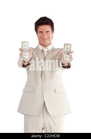 Freudige Geschäftsmann hält US-Dollar Stockfoto