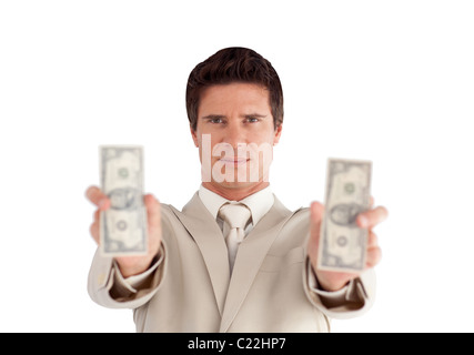 Freudige Geschäftsmann mit Dollar auf seinen Händen Stockfoto