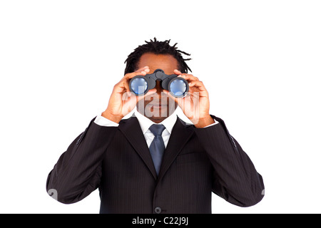 Fröhliche Geschäftsmann mit dem Fernglas vor einem weißen Hintergrund Stockfoto