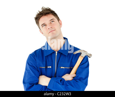 Nachdenklich männlichen Arbeitnehmer mit einem hammer Stockfoto