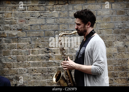 Saxophonist bei Bricklane London England Stockfoto