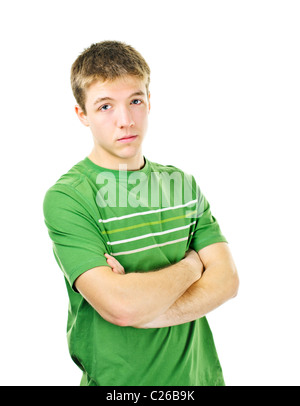 Ernst junger Mann stehend mit Arme gekreuzt isolierten auf weißen Hintergrund Stockfoto