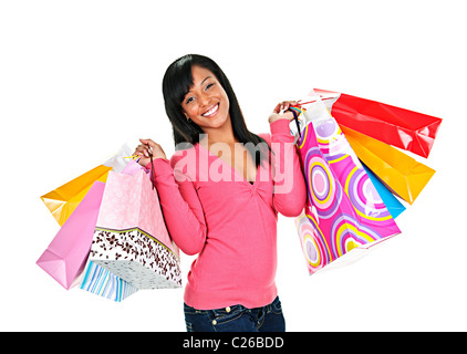 Junge lächelnde schwarze Frau mit bunten Einkaufstüten Stockfoto