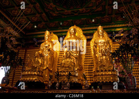 Die drei goldene Buddha-Statue im chinesischen Tempel von Thailand Stockfoto
