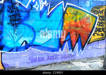 Graffiti an der Wand, Expressionismus und soziale messaging, seltsame und bizarre Kunst, Bangkok, thailand Stockfoto