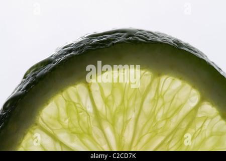 Grünen Limetten Scheiben Nahaufnahme Hintergrund. Stockfoto