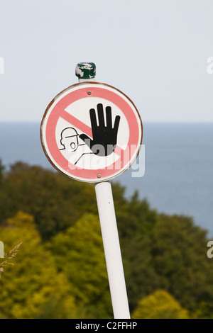 Schild mit schwarzen Hand halten Stockfoto