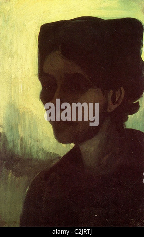 Kopf einer jungen Bäuerin mit dunklen Cap Stockfoto