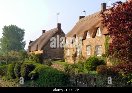 Strohgedeckten Hütten in Ebrington Dorf, Gloucestershire, England, UK Stockfoto