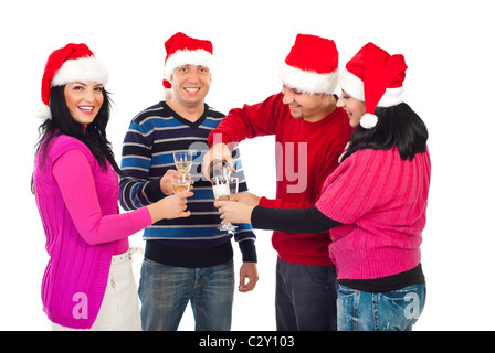 Happy Christmas Freunde Gießen Champagner Gläser auf die Verkostung zusammen isoliert auf weißem Hintergrund Stockfoto