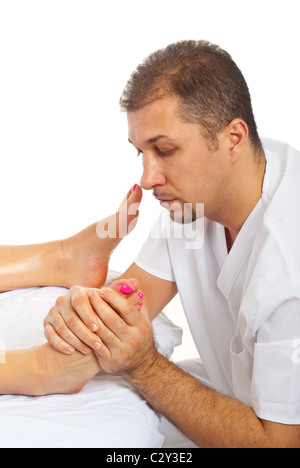 Orthopäde Mann mit Bart massierende Frau ' Bein Stockfoto