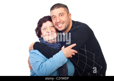 Glücklich Enkel umarmt ihre Großmutter isoliert auf weißem Hintergrund Stockfoto