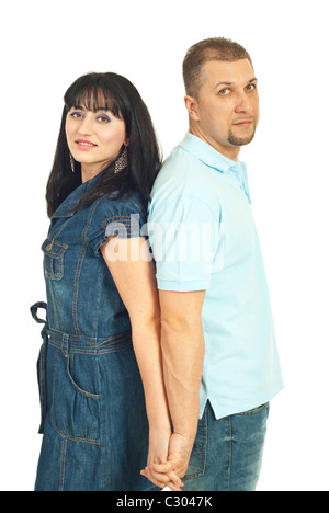 Modernen Mitte erwachsenes paar stehen Rücken an Rücken und halten die Hände isoliert auf weißem Hintergrund Stockfoto