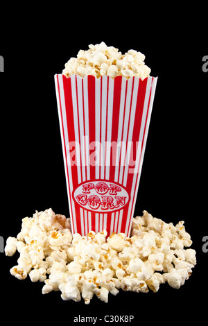 Bild von Popcorn in einer Halterung mit Popcorn auf der Unterseite Stockfoto