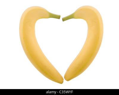 zwei Bananen in Herzform auf weißem Hintergrund Stockfoto