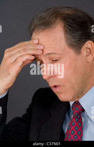 Porträt von gestressten Geschäftsmann Stockfoto
