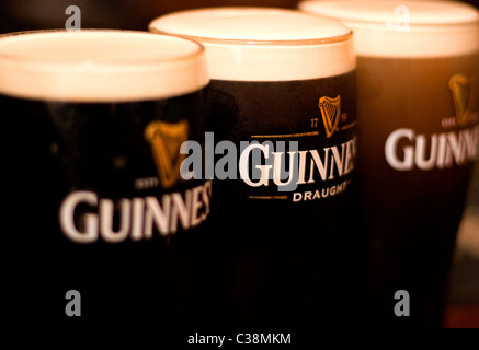 Anschauliches Bild von Guinness Pints. Stockfoto