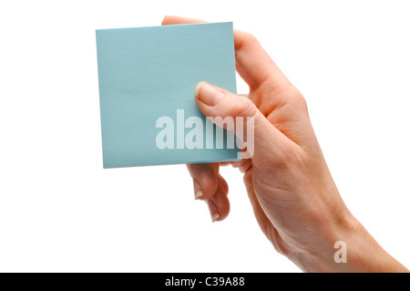 hand fingers holding blue note pad Stockfoto
