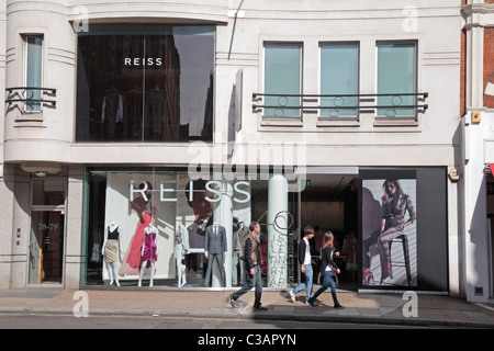 Die Ladenfront und Eintritt in die Reiss-Mode auf die New Bond Street, London. Apr 2011 Stockfoto