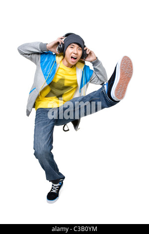 Menschen hören Musik stehen auf einem Bein Stockfoto