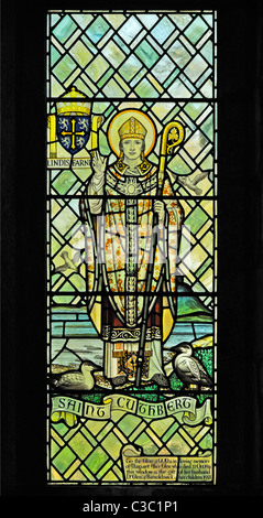 Saint Cuthbert Fenster. Kirche von Saint Kentigern, Caldbeck, Cumbria, England, Vereinigtes Königreich, Europa. Stockfoto