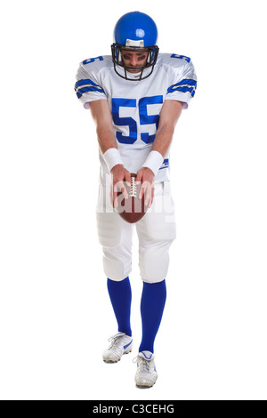 Foto von einem American Football-Spieler, auf einem weißen Hintergrund ausschneiden. Stockfoto