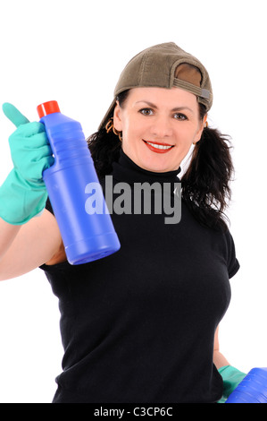 Die Frau in eine Kappe und grüne Handschuhe untersucht ein Spülmittel Stockfoto