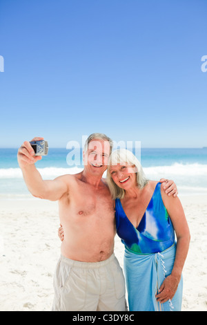 Paar, ein Foto von sich selbst am Strand Stockfoto