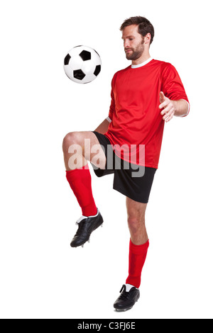 Foto von einem Fußballer oder Fußball Spieler Ausschneiden auf weißem Hintergrund. Stockfoto