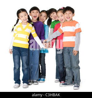 Eine Gruppe von Freunden, die gemeinsam ihre Hände Inbetriebnahme Stockfoto