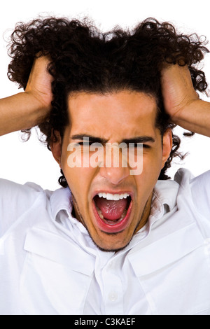 Verärgerter Mann schreien und posiert isoliert auf weiß Stockfoto