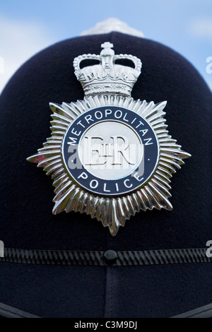 London Metropolitan / Met Polizei / Polizist der Helm / Mütze mit Kappe Abzeichen. Stockfoto