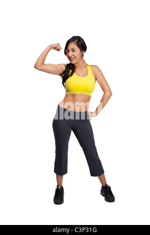 Ziemlich Hispanic Frau mit Übung Kleidung auf einem weißen Hintergrund Stockfoto