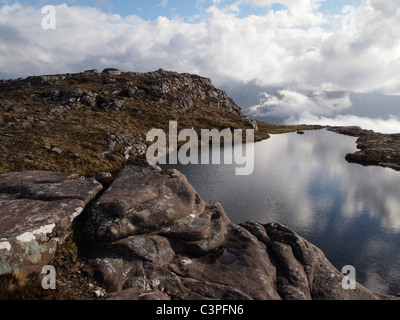 Kleine man auf Beinn Nam Ban in der Nähe von Ullapool, Schottland Stockfoto