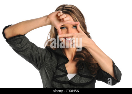 Portrait of beautiful businesswoman framing face with hands isolated over white background Stockfoto