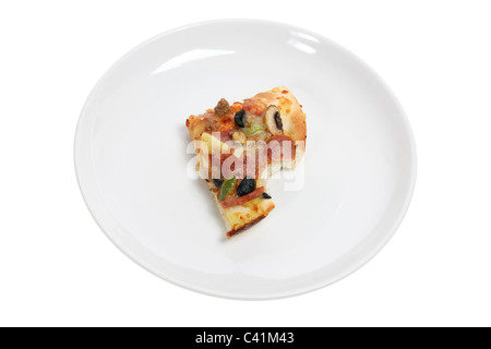 Stück Pizza auf Platte Stockfoto